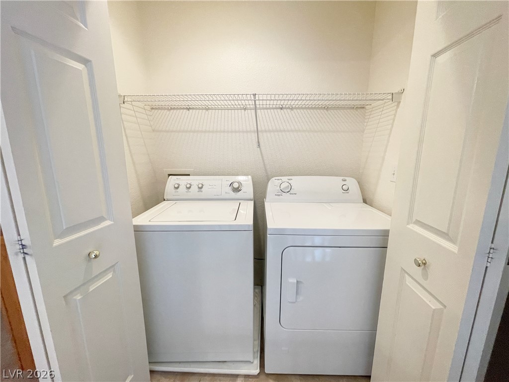 691 Principle Point Avenue Henderson, NV 89012 - Photo 28 of 30 A dedicated laundry space provides optimal functionality and convenience.