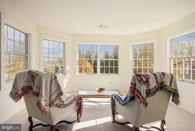 a view of a bathroom from a hallway