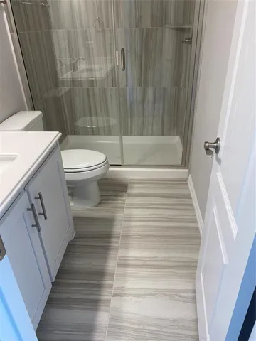 a bathroom with a sink and a shower