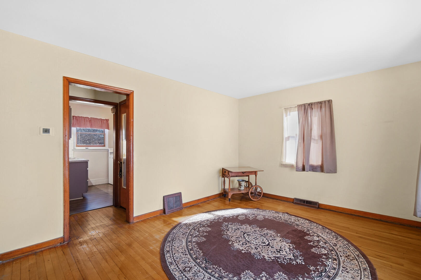 5405 Birch Avenue Hammond, IN 46320 - Photo 4 of 20 a view of a bedroom with a bed and wooden floor