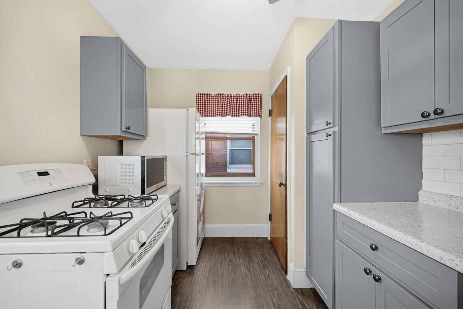 5405 Birch Avenue Hammond, IN 46320 - Photo 6 of 20 a kitchen with a stove and a sink