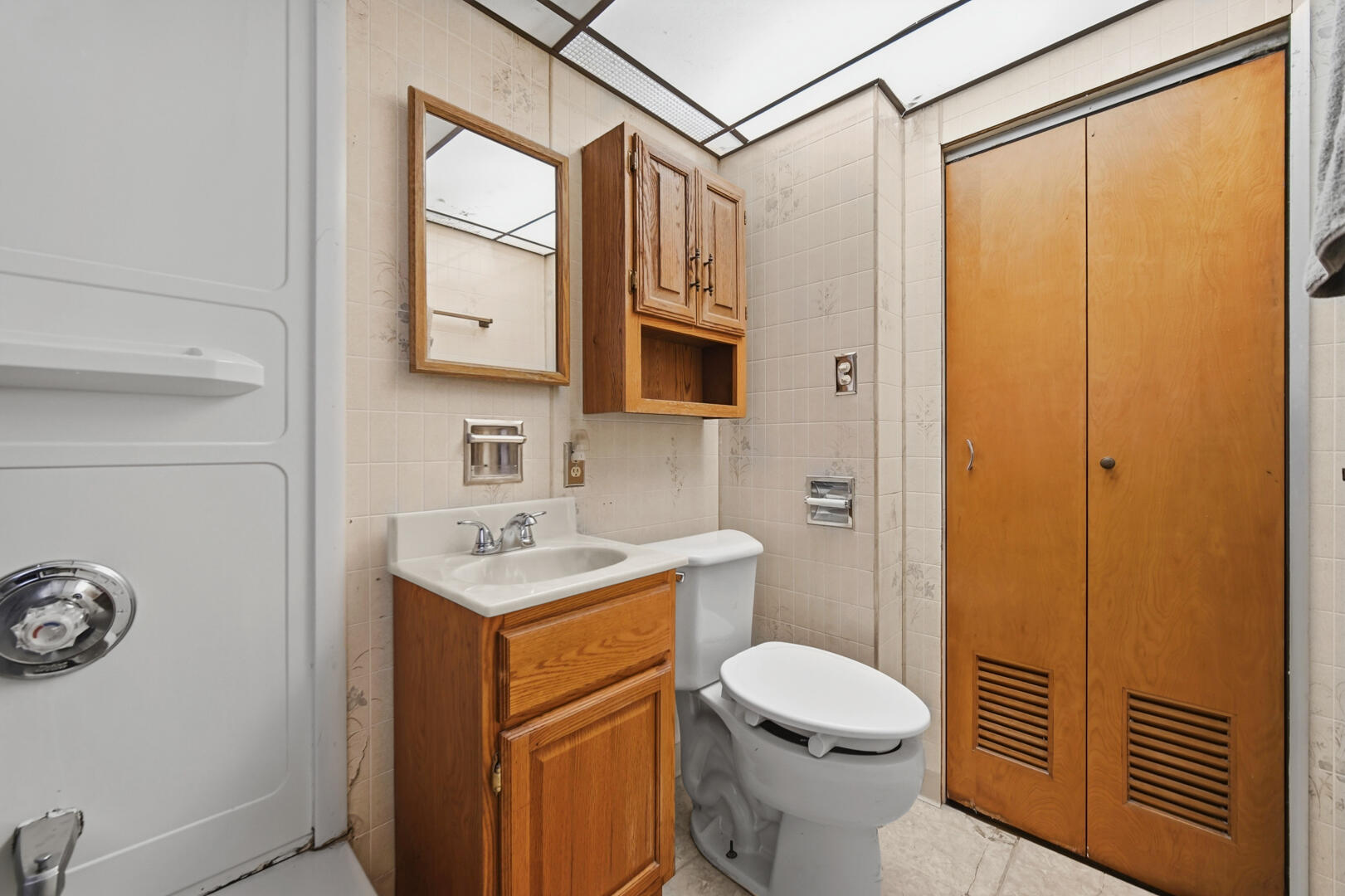 5405 Birch Avenue Hammond, IN 46320 - Photo 10 of 20 a bathroom with a sink a toilet and shower
