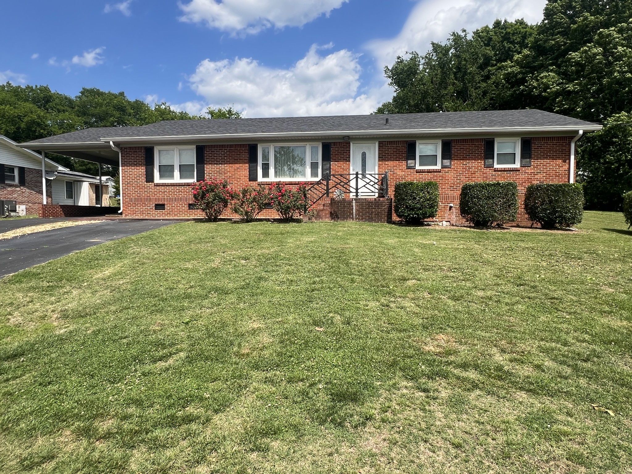 105 Tollgate Road Pulaski, TN 38478 - Photo 1 of 38 a front view of house with yard and green space
