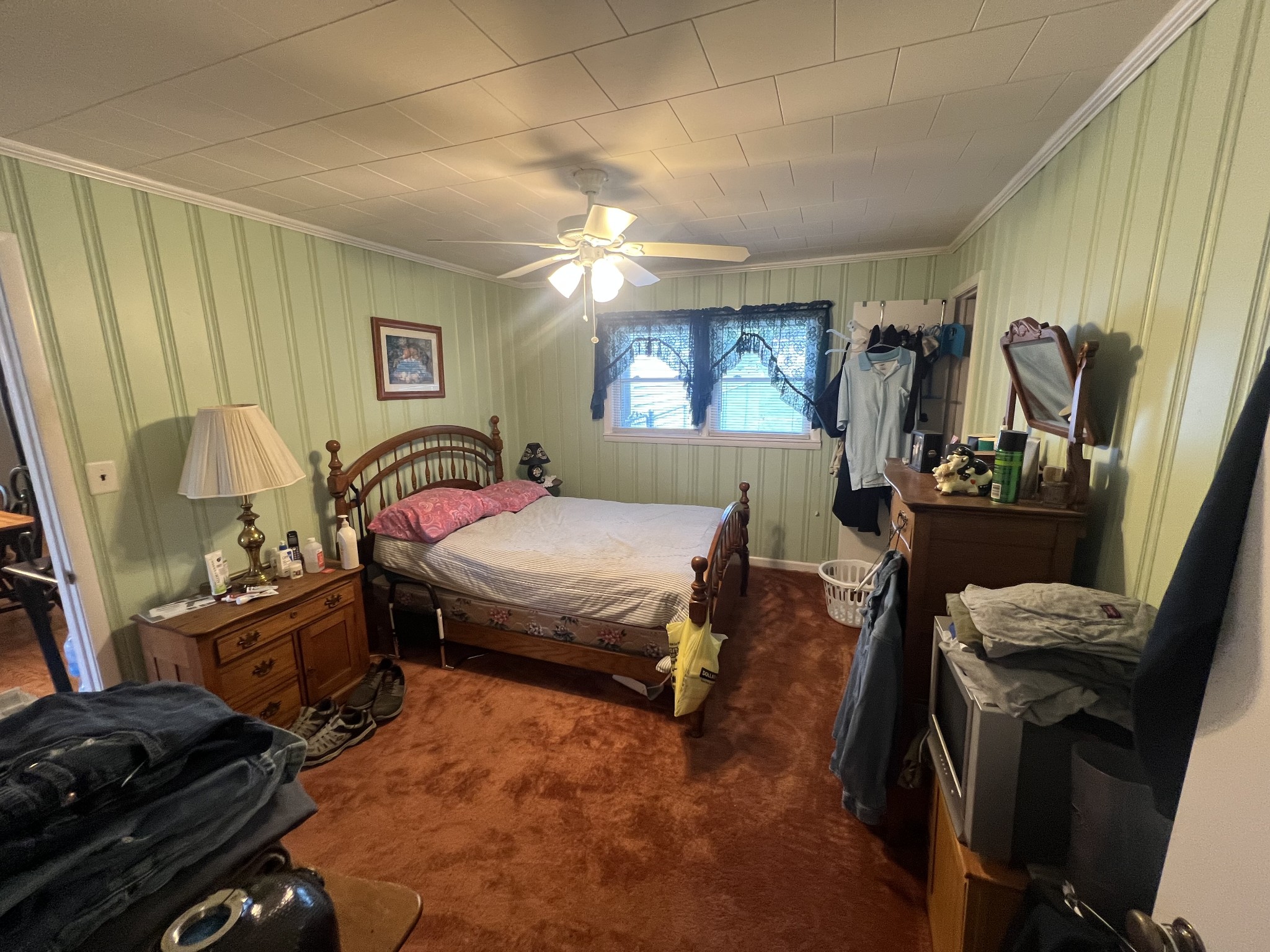 105 Tollgate Road Pulaski, TN 38478 - Photo 16 of 38 a bedroom with a bed and a mirror