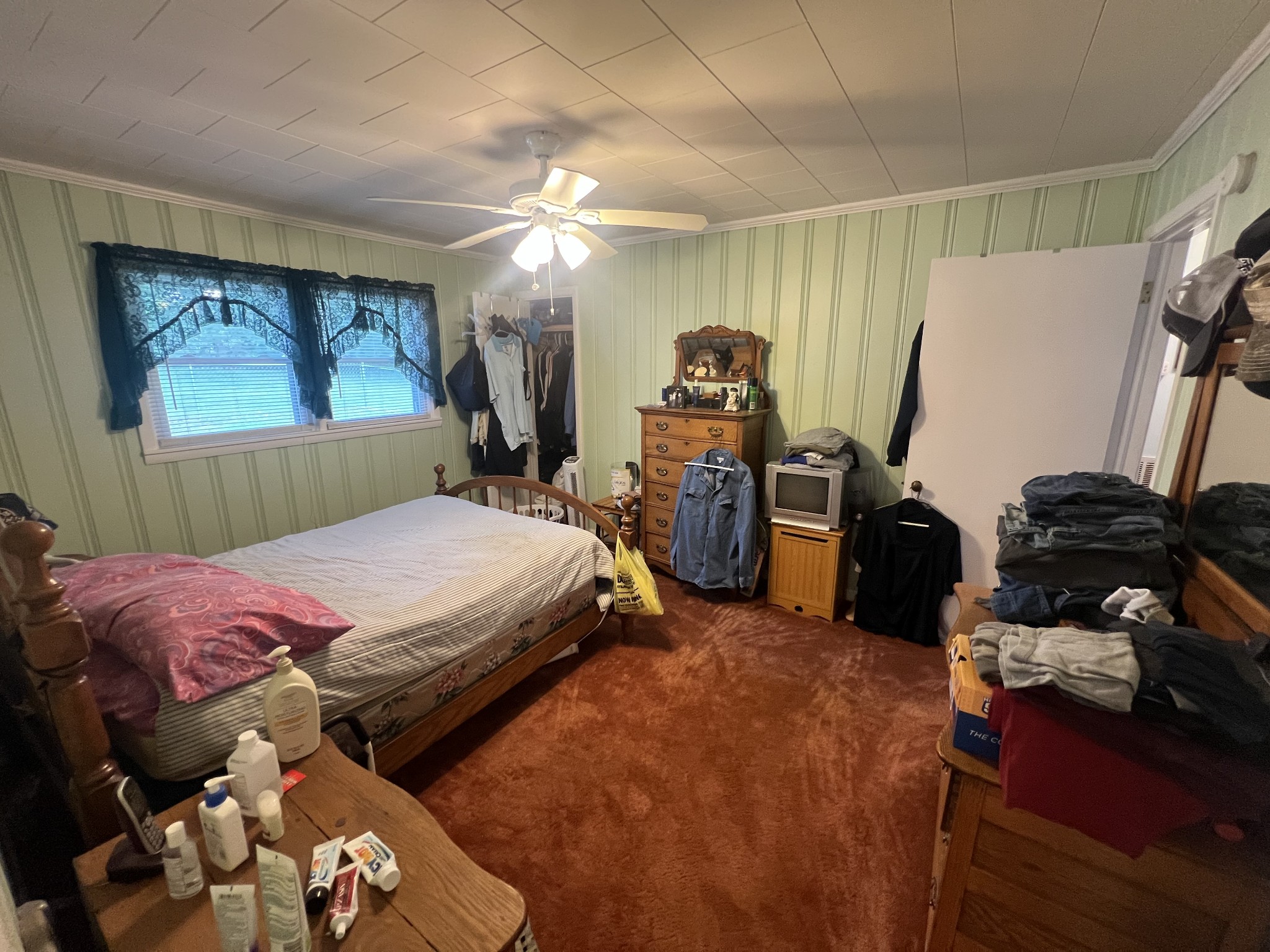 105 Tollgate Road Pulaski, TN 38478 - Photo 17 of 38 a bedroom with bed and a tv