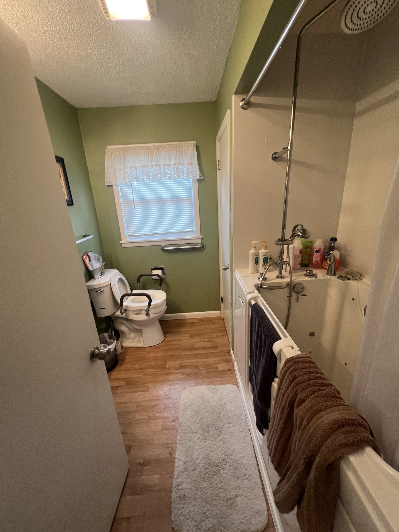 105 Tollgate Road Pulaski, TN 38478 - Photo 18 of 38 a bathroom with a sink a toilet and a bathtub