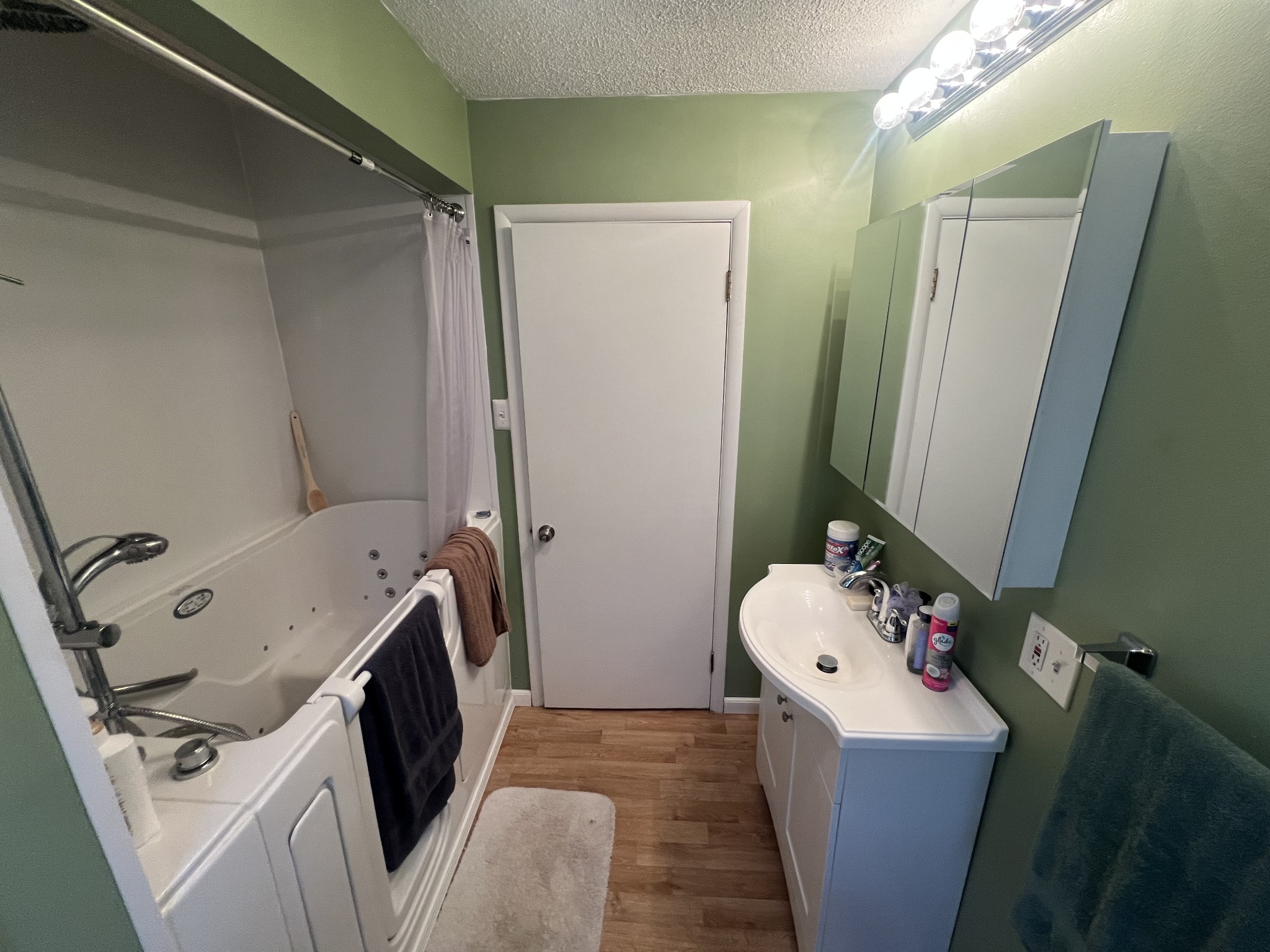 105 Tollgate Road Pulaski, TN 38478 - Photo 19 of 38 a bathroom with a tub sink and mirror