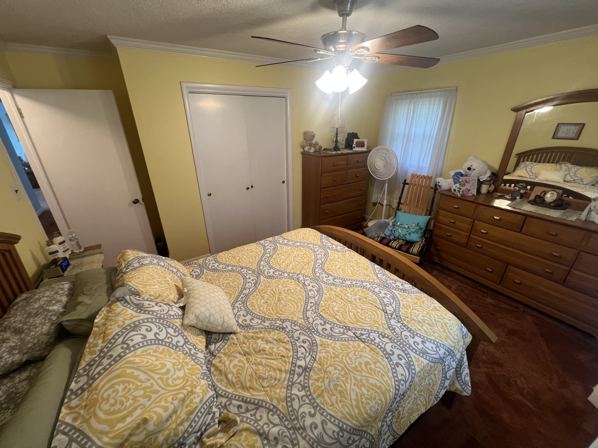 105 Tollgate Road Pulaski, TN 38478 - Photo 20 of 38 a bed sitting in a bedroom next to a window