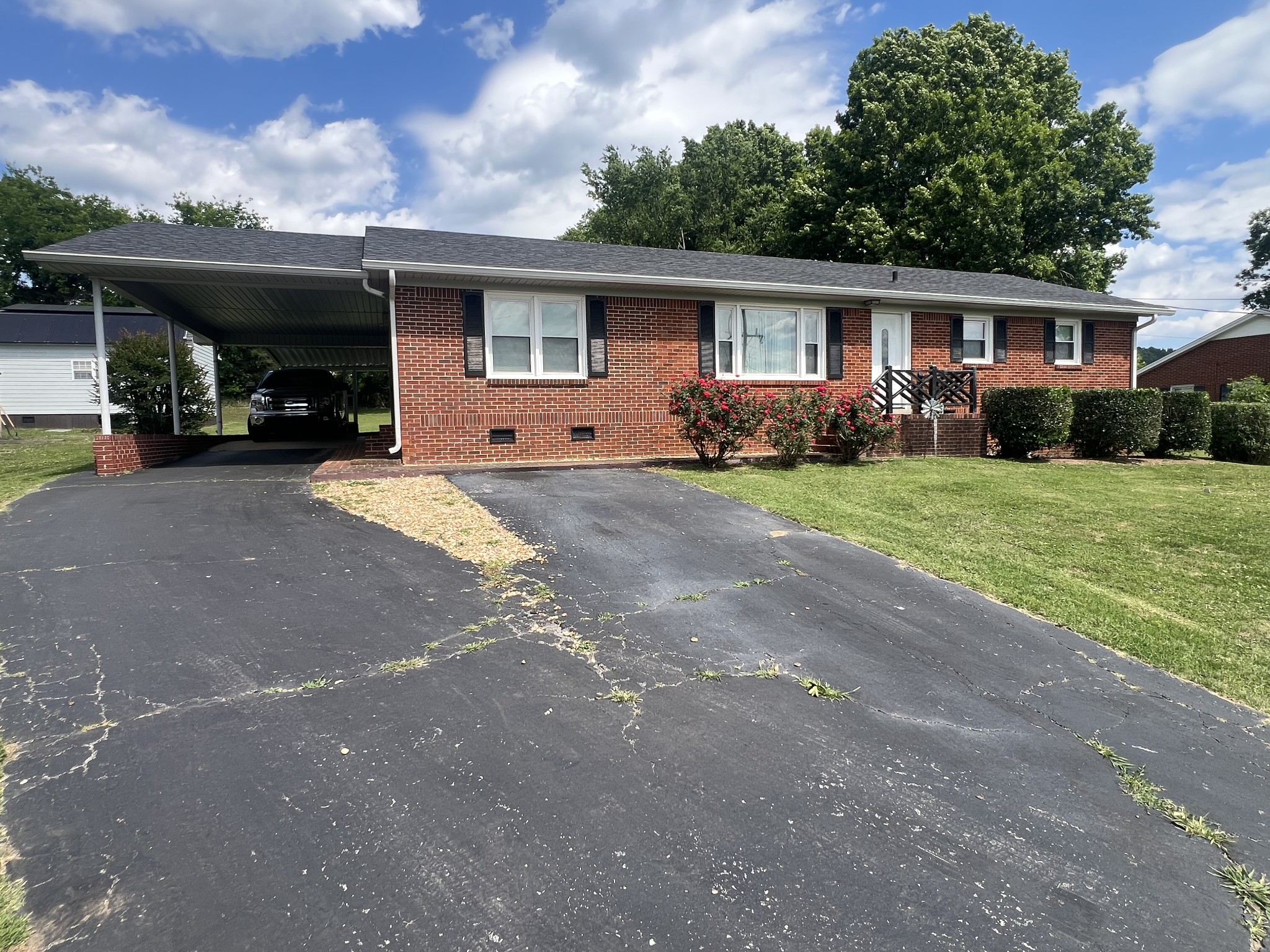 105 Tollgate Road Pulaski, TN 38478 - Photo 2 of 38 a front view of house with yard and trees