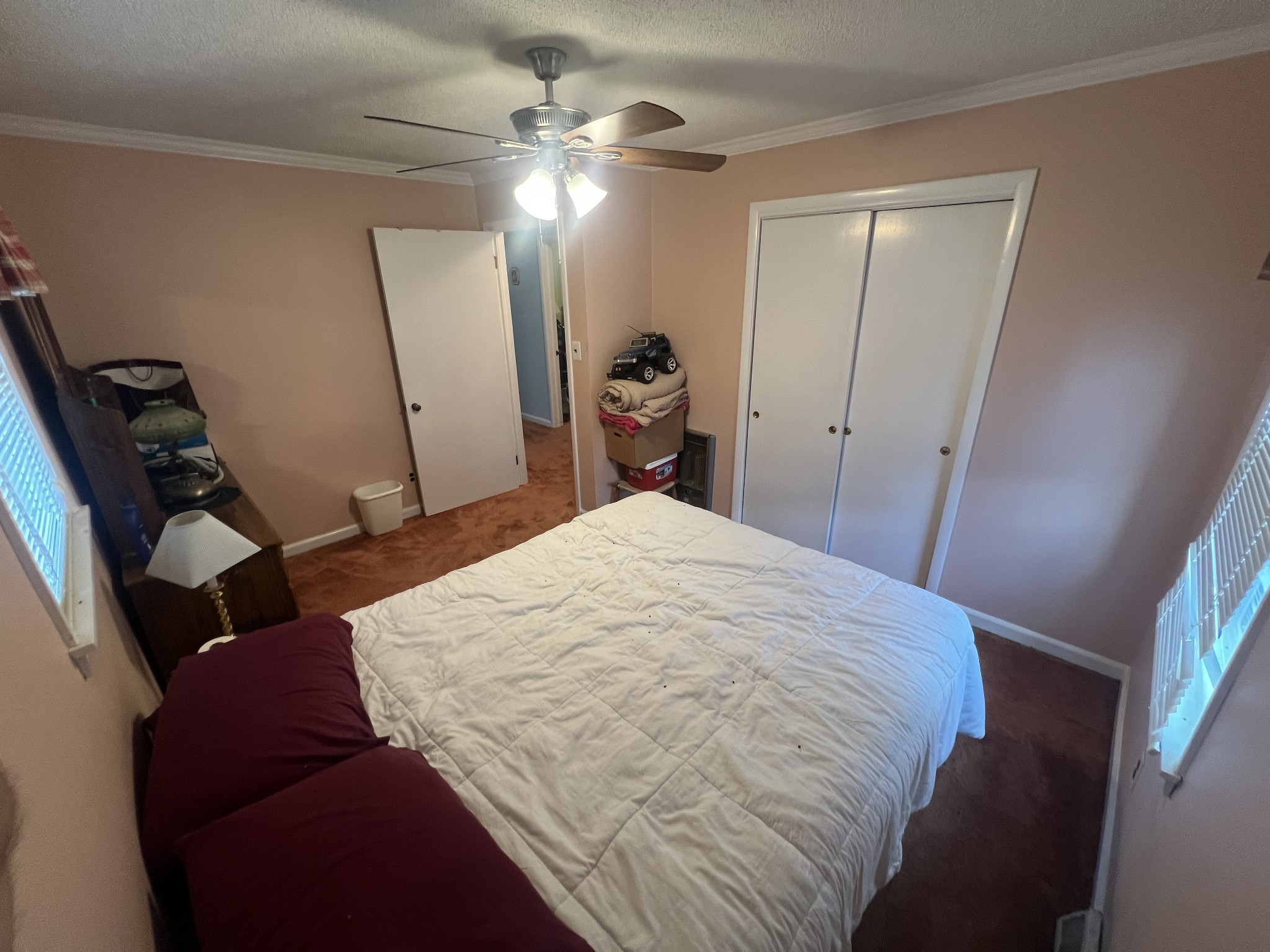 105 Tollgate Road Pulaski, TN 38478 - Photo 22 of 38 a bedroom with a bed and a mirror