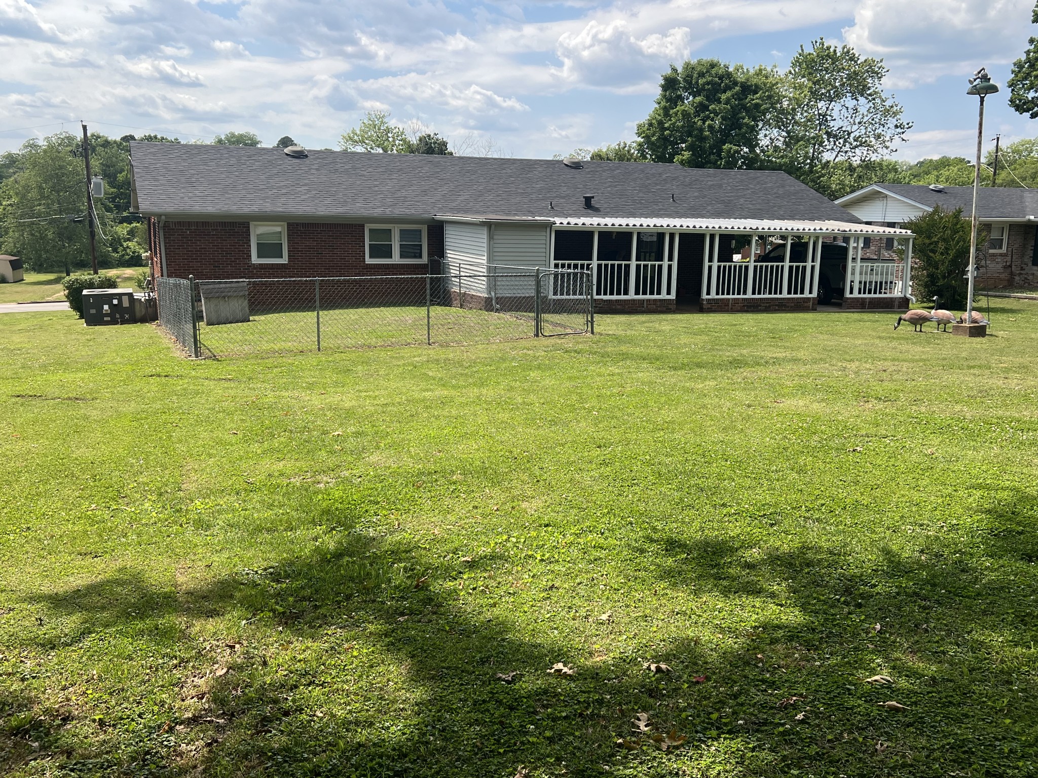 105 Tollgate Road Pulaski, TN 38478 - Photo 29 of 38 a view of a house with pool and chairs