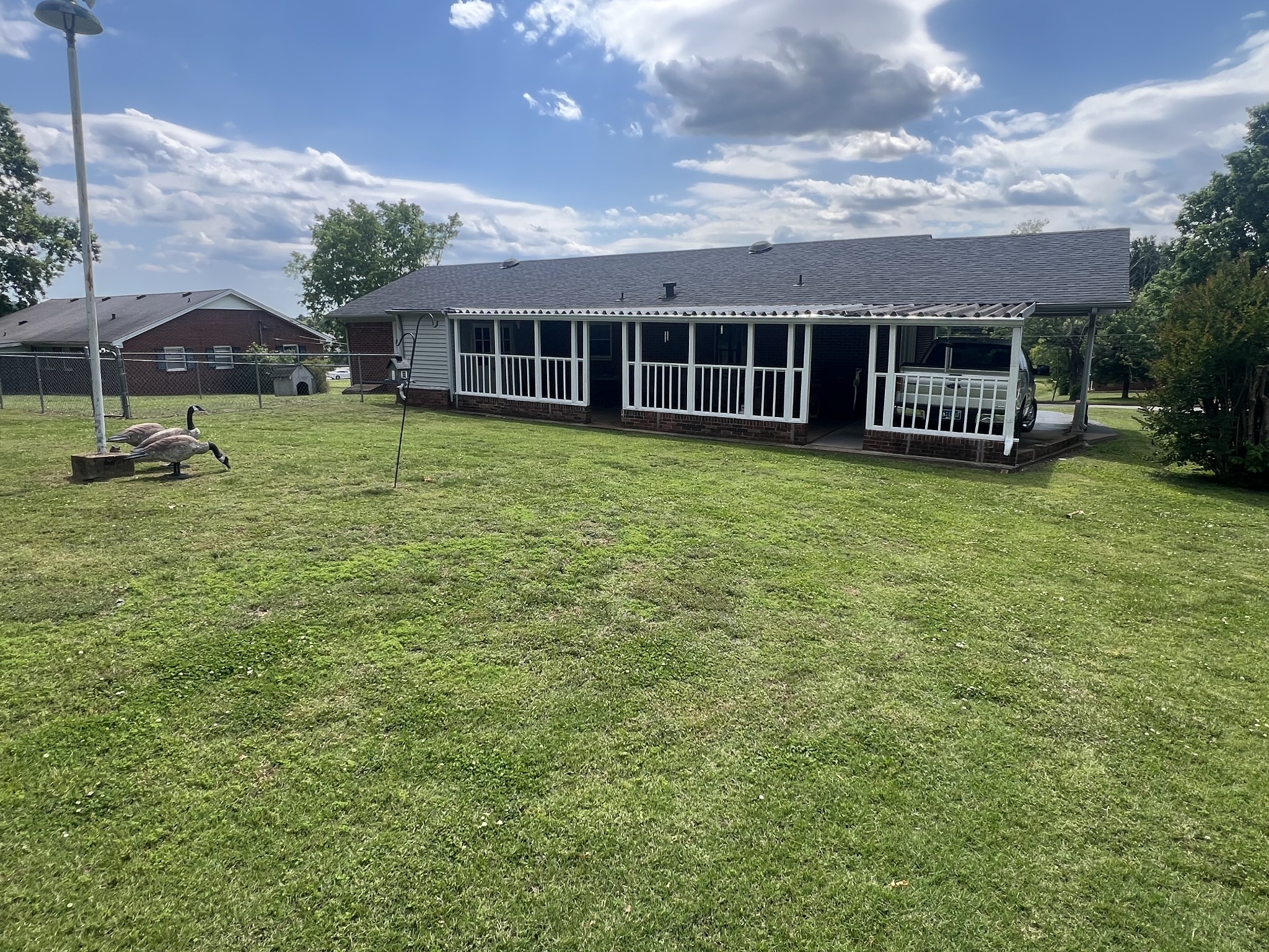 105 Tollgate Road Pulaski, TN 38478 - Photo 35 of 38 a view of a house with a backyard