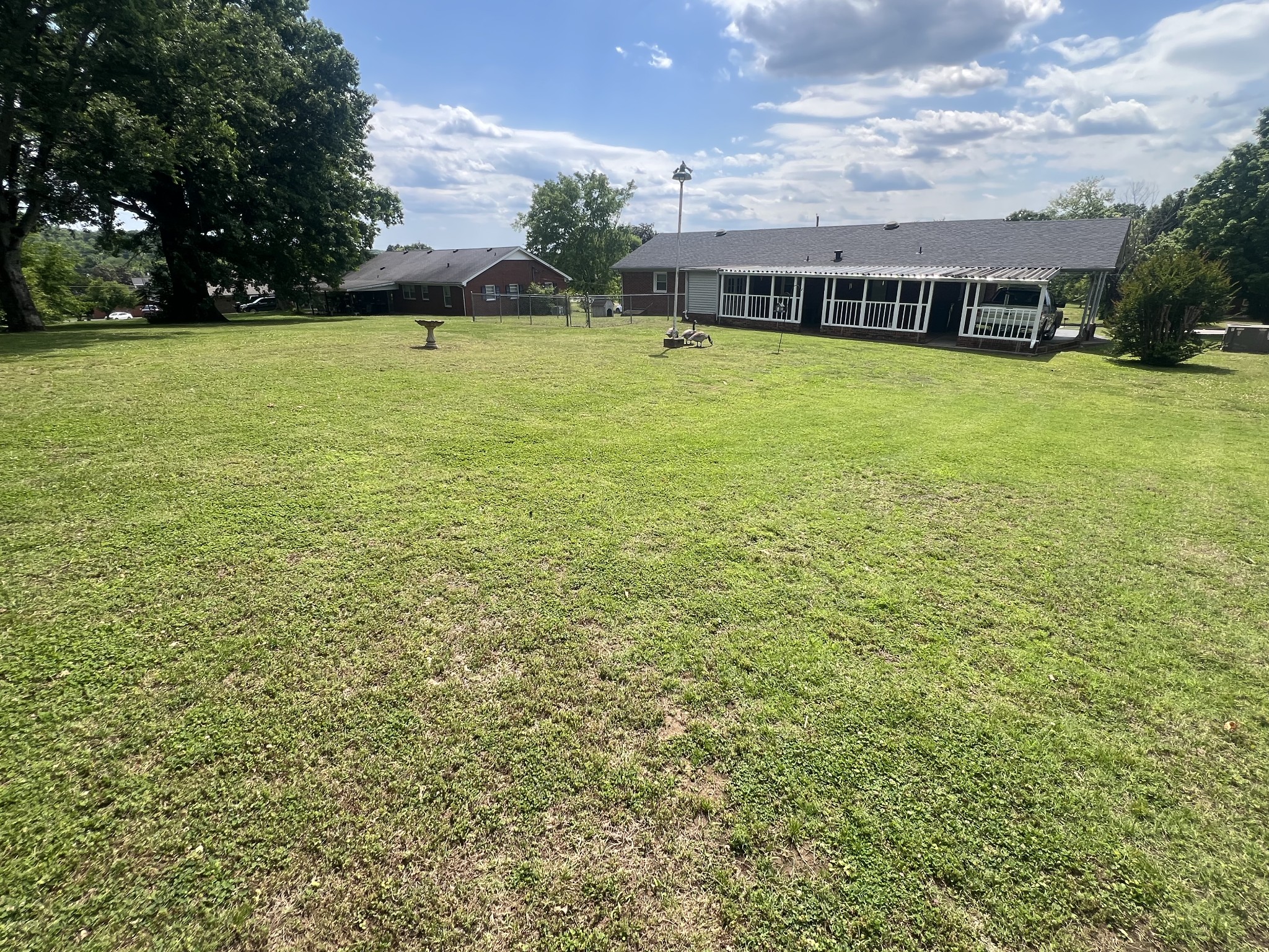 105 Tollgate Road Pulaski, TN 38478 - Photo 37 of 38 a view of a large pool with an outdoor space and seating area