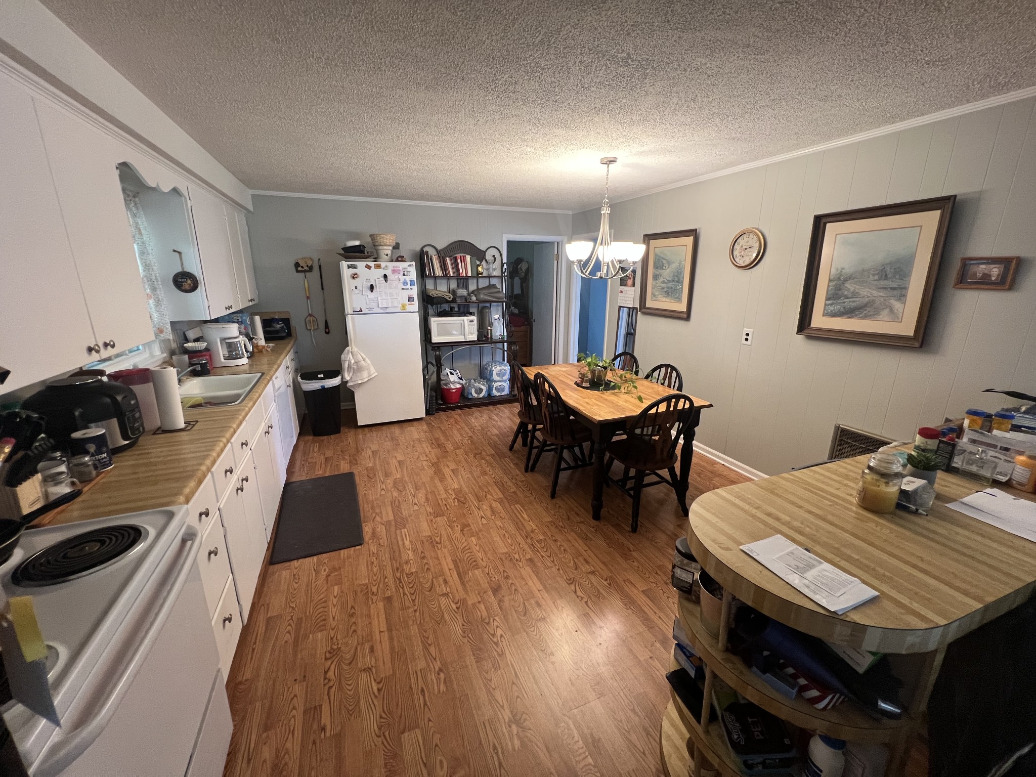 105 Tollgate Road Pulaski, TN 38478 - Photo 9 of 38 a view of a dining room with furniture and wooden floor