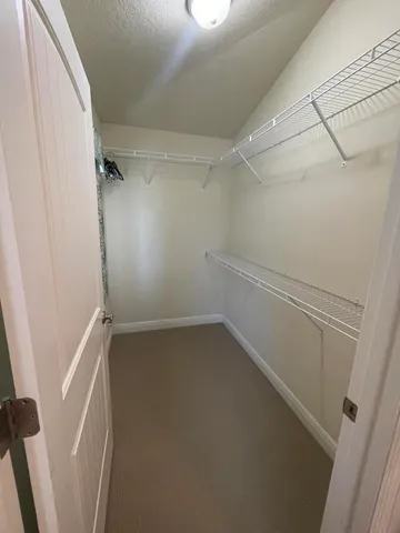 a view of a room with racks on the wall