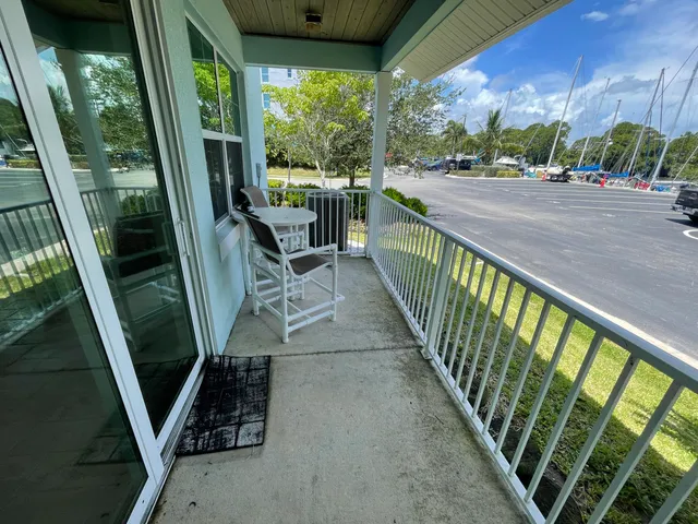 a view of a porch with furniture