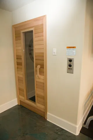 an empty room with wooden floor