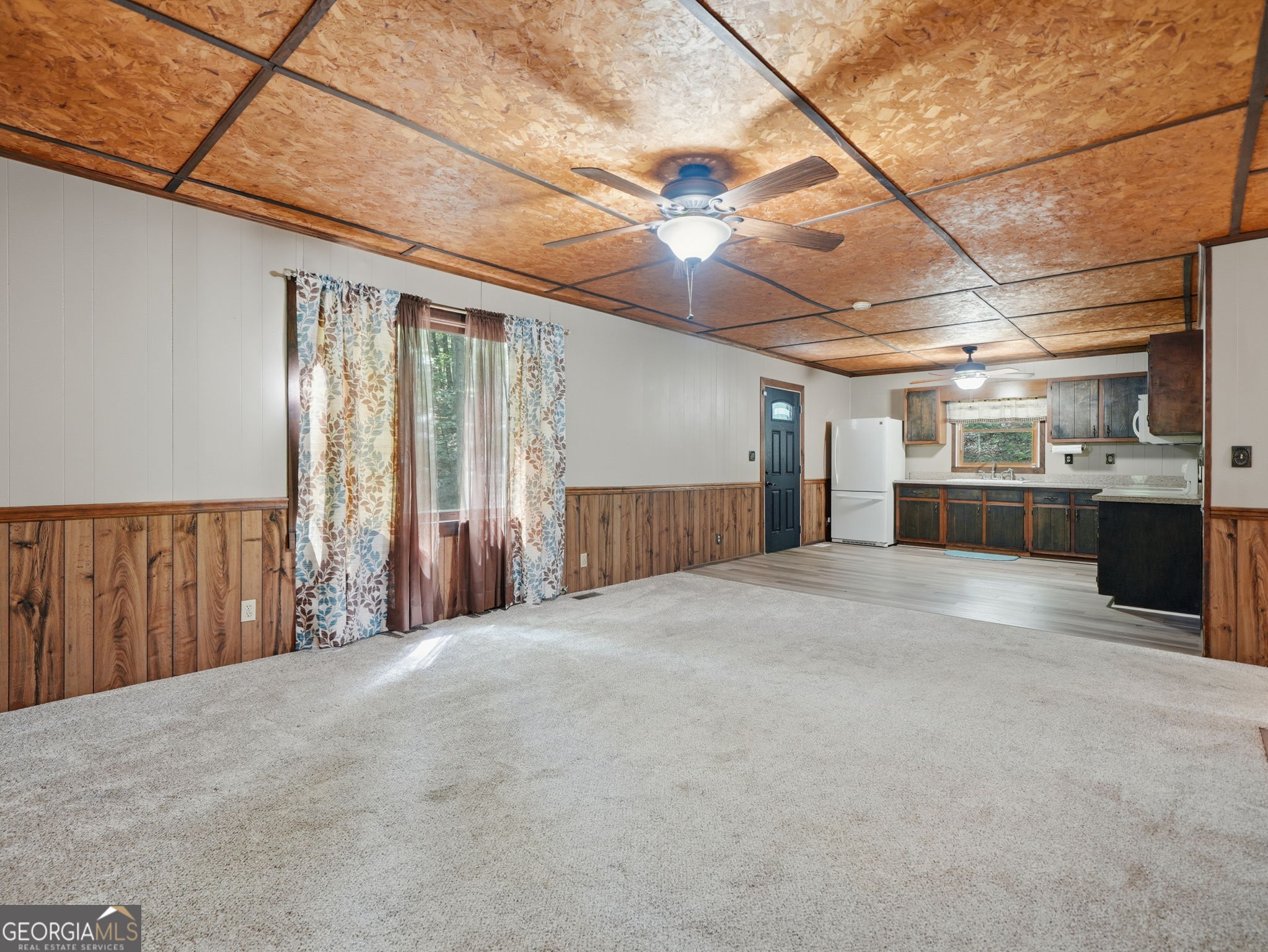 629 Goose Island Road Cherry Log, GA 30522 - Photo 4 of 52 a view of an empty room with a fireplace