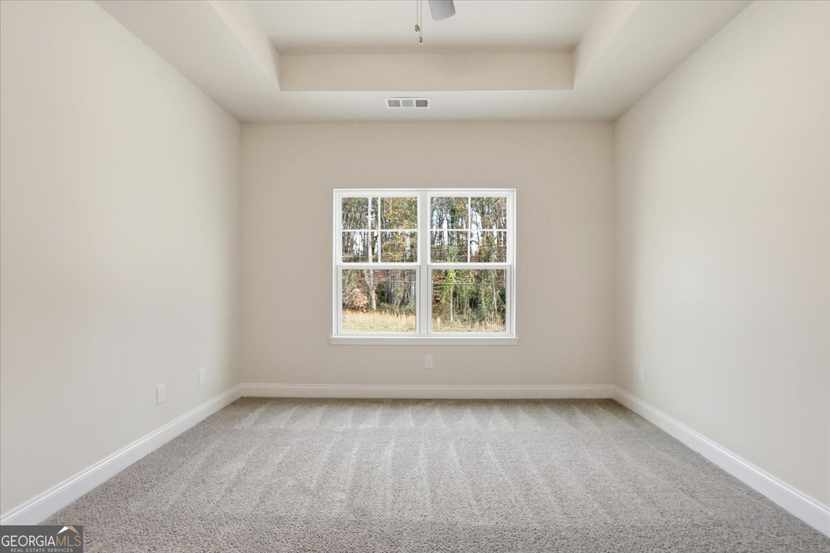 49 Wright Street, Unit 65 Lavonia, GA 30553 - Photo 28 of 57 an empty room with a window