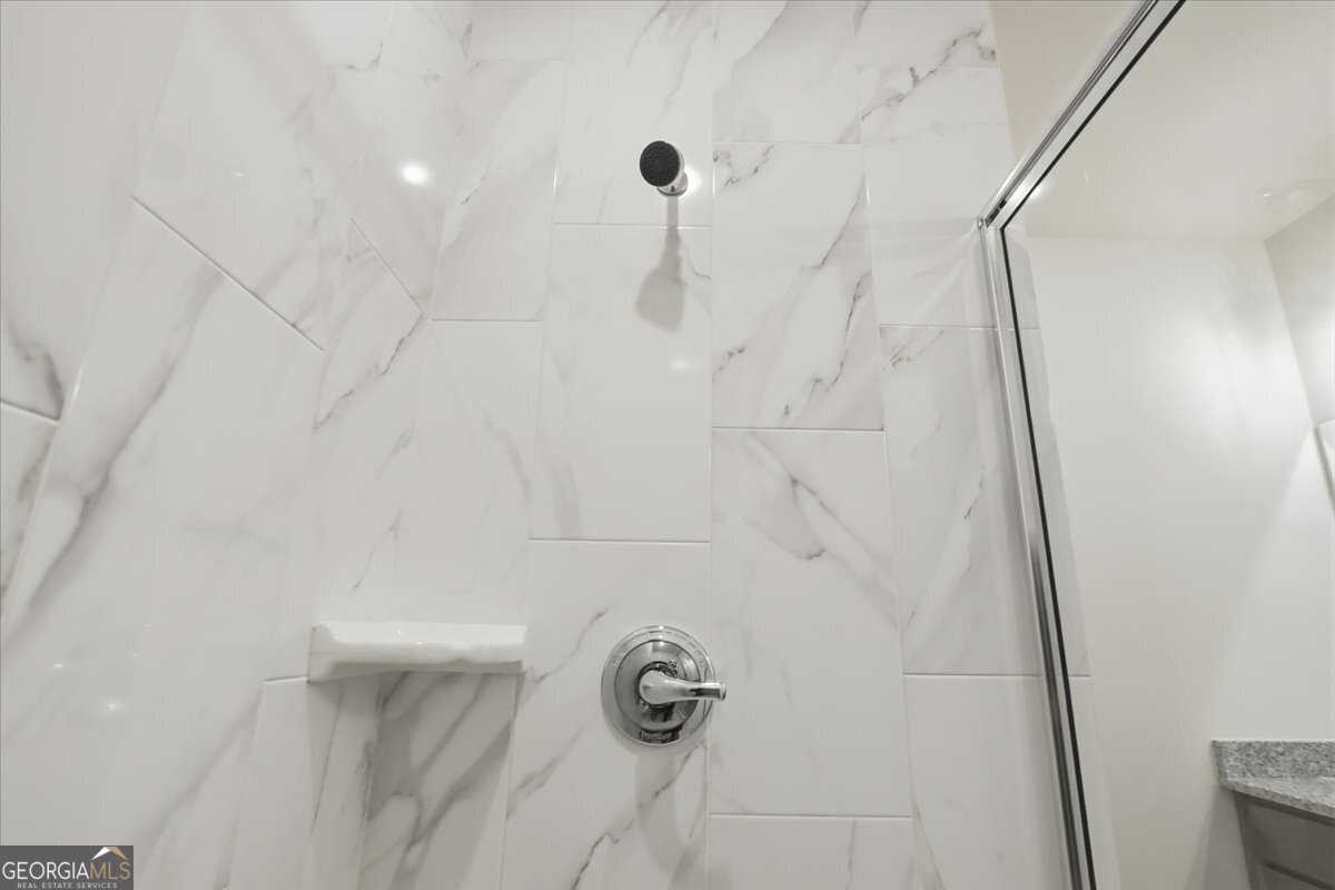 49 Wright Street, Unit 65 Lavonia, GA 30553 - Photo 36 of 57 a bathroom with a shower