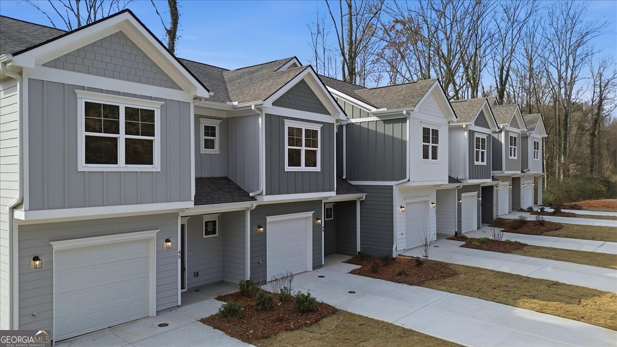 49 Wright Street, Unit 65 Lavonia, GA 30553 - Photo 49 of 57 a front view of a house with a yard