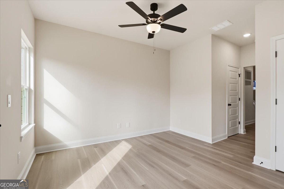 49 Wright Street, Unit 65 Lavonia, GA 30553 - Photo 7 of 57 a view of a hallway with a ceiling fan