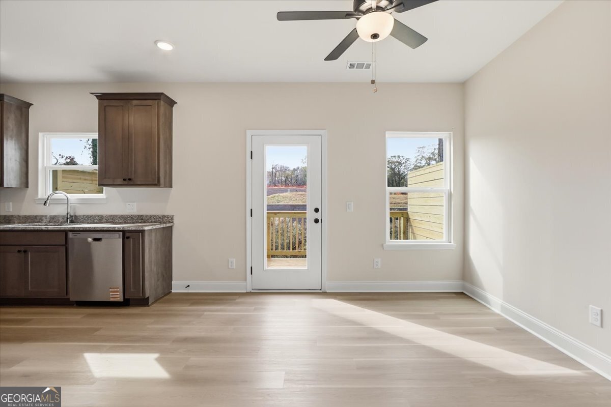 49 Wright Street, Unit 65 Lavonia, GA 30553 - Photo 8 of 57 a view of an empty room with a window