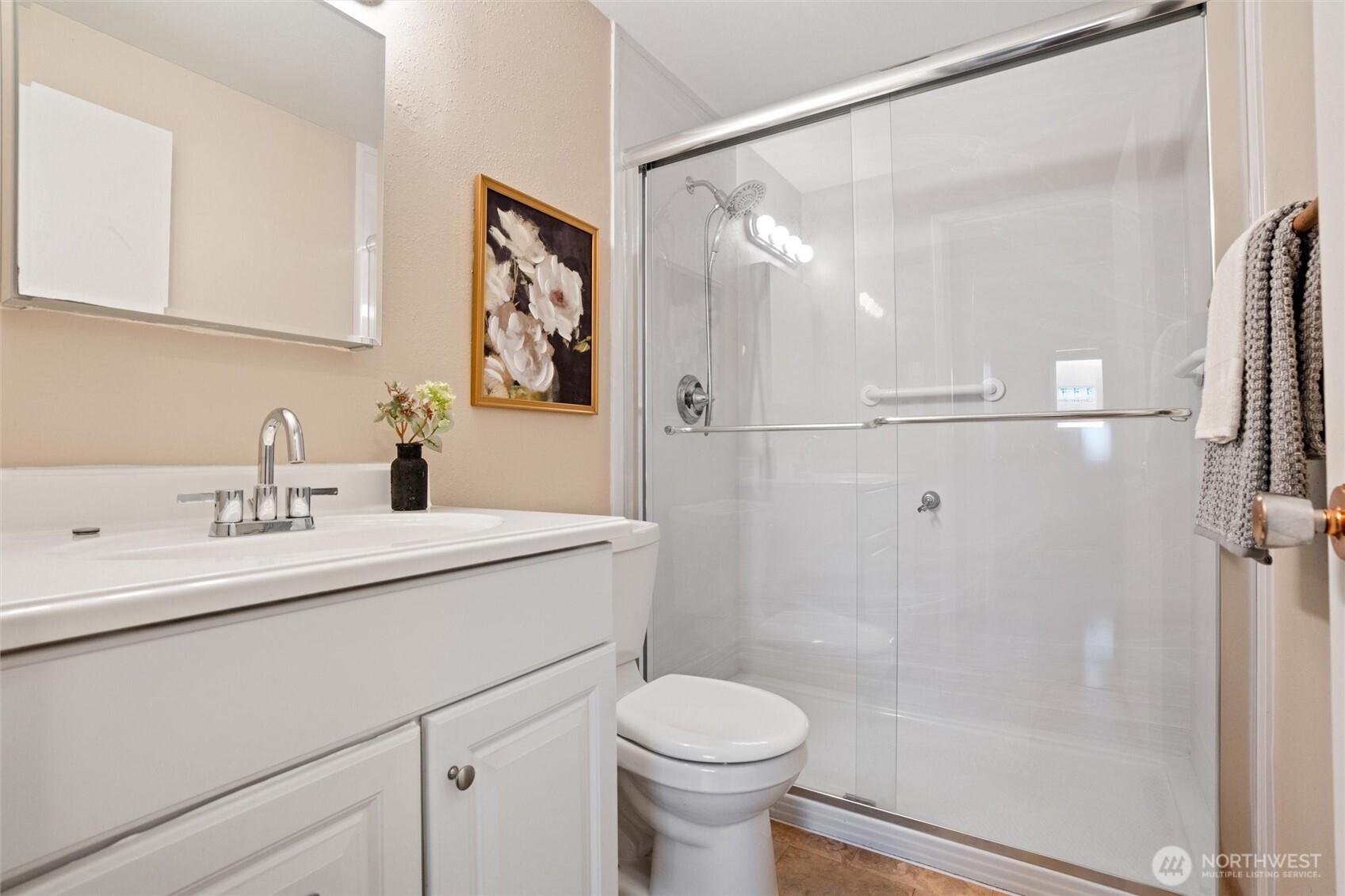 3876 Northeast Pinecone Drive Bremerton, WA 98310 - Photo 17 of 27 a bathroom with a sink toilet and shower