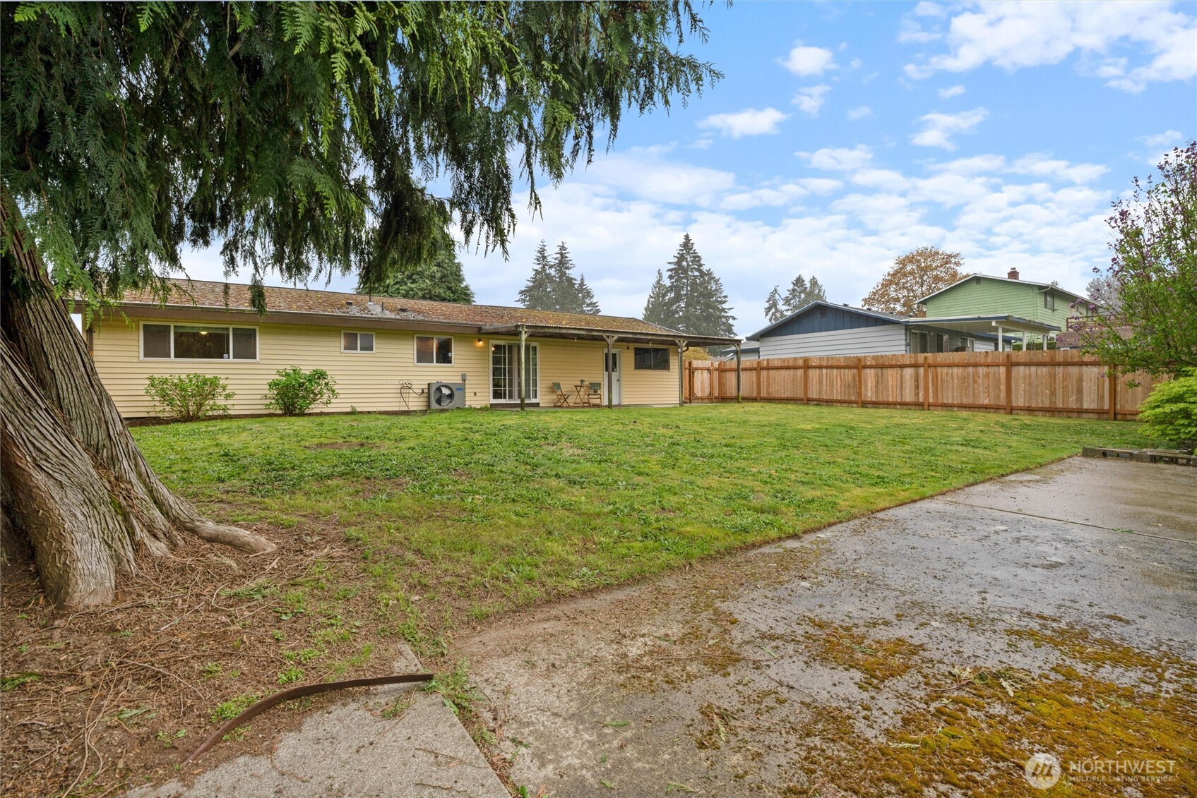 3876 Northeast Pinecone Drive Bremerton, WA 98310 - Photo 23 of 27 front view of a house with a yard