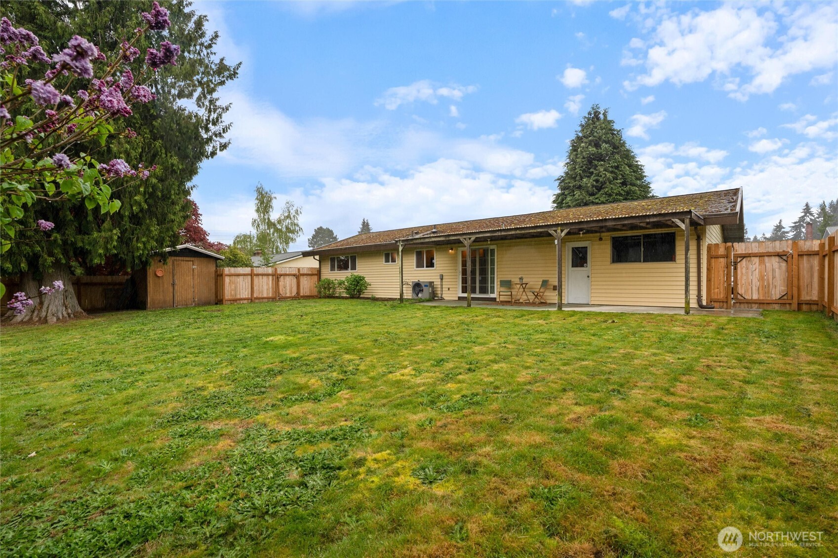 3876 Northeast Pinecone Drive Bremerton, WA 98310 - Photo 26 of 27 a front view of house with garden