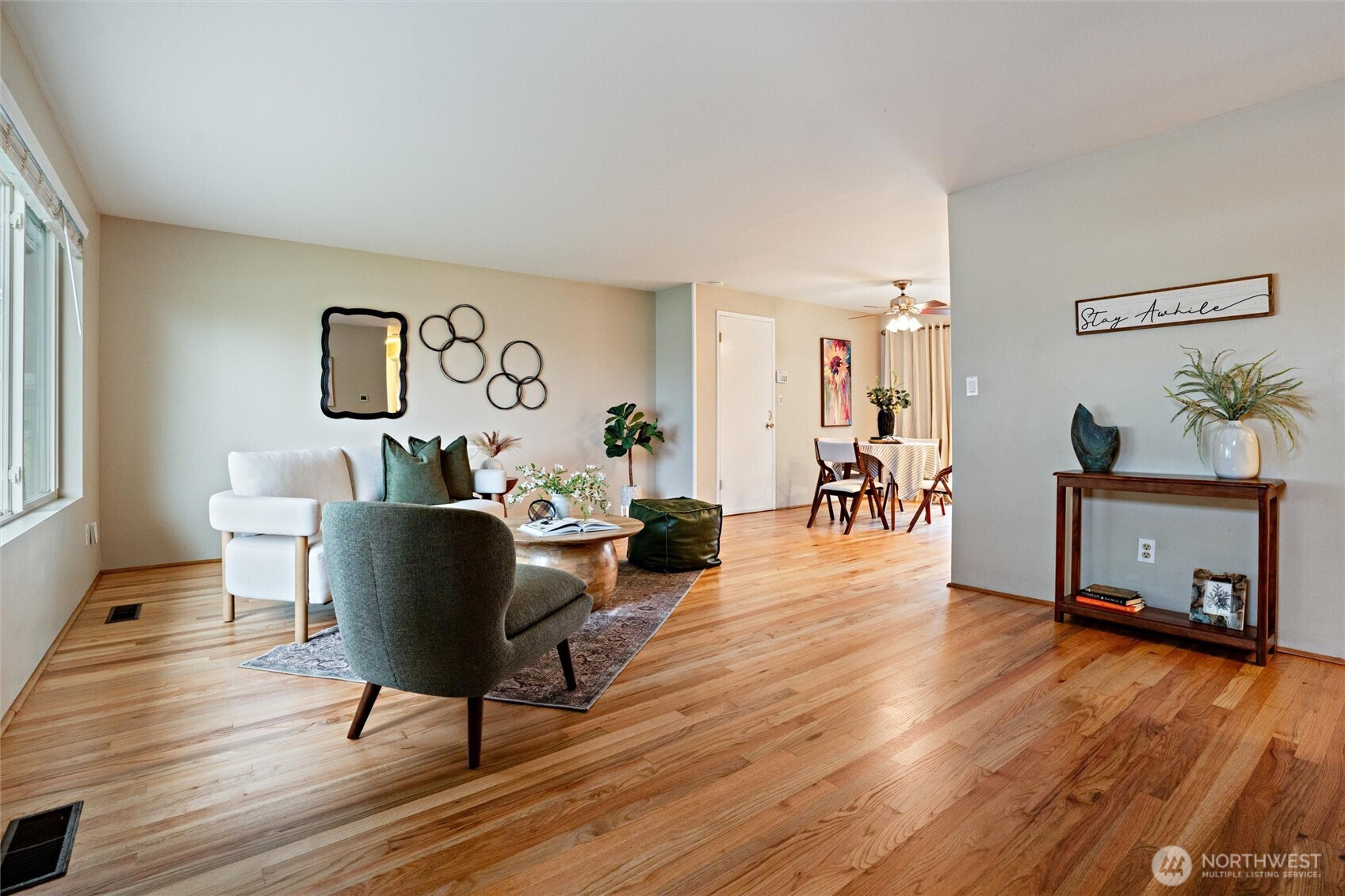 3876 Northeast Pinecone Drive Bremerton, WA 98310 - Photo 6 of 27 a living room with furniture and wooden floor
