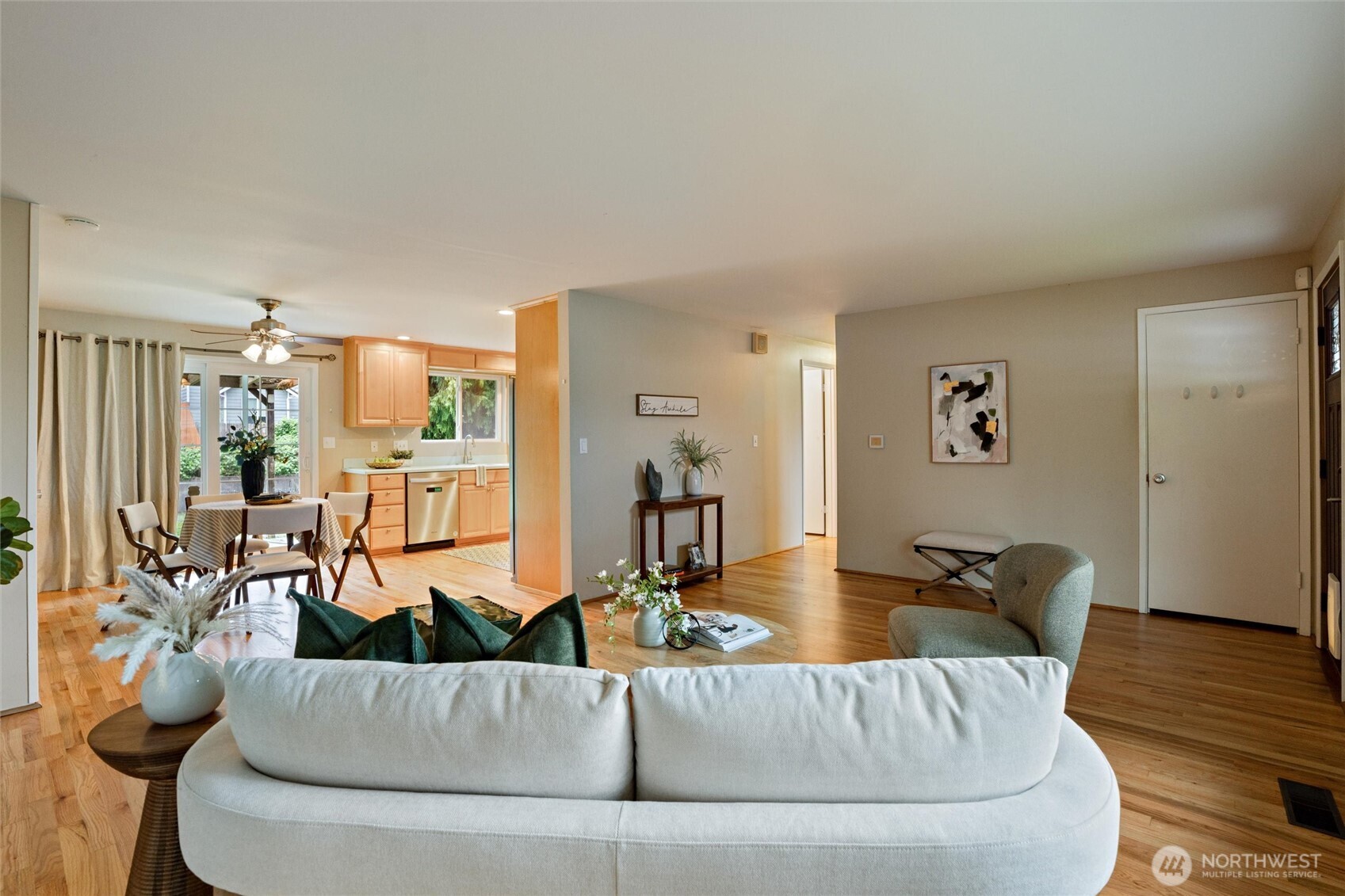 3876 Northeast Pinecone Drive Bremerton, WA 98310 - Photo 8 of 27 a living room with furniture and wooden floor