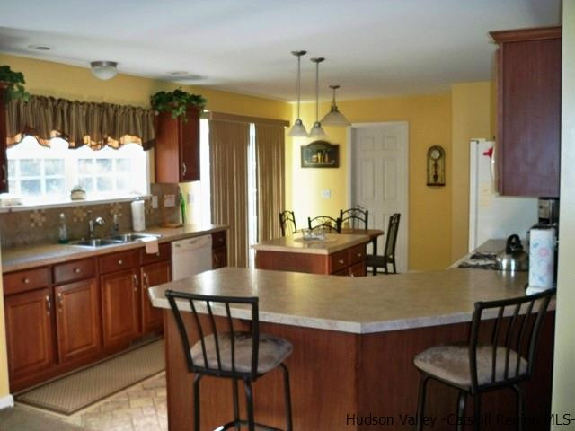 548 Carroll Hinkley Road Roxbury, NY 12474 - Photo 7 of 35 a dining table with chairs and window