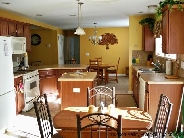 548 Carroll Hinkley Road Roxbury, NY 12474 - Photo 8 of 35 a view of a dining room with furniture
