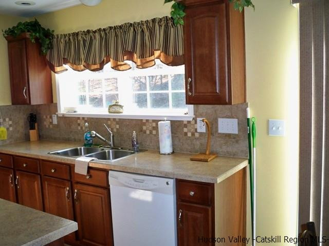 548 Carroll Hinkley Road Roxbury, NY 12474 - Photo 9 of 35 a kitchen with a sink and cabinets