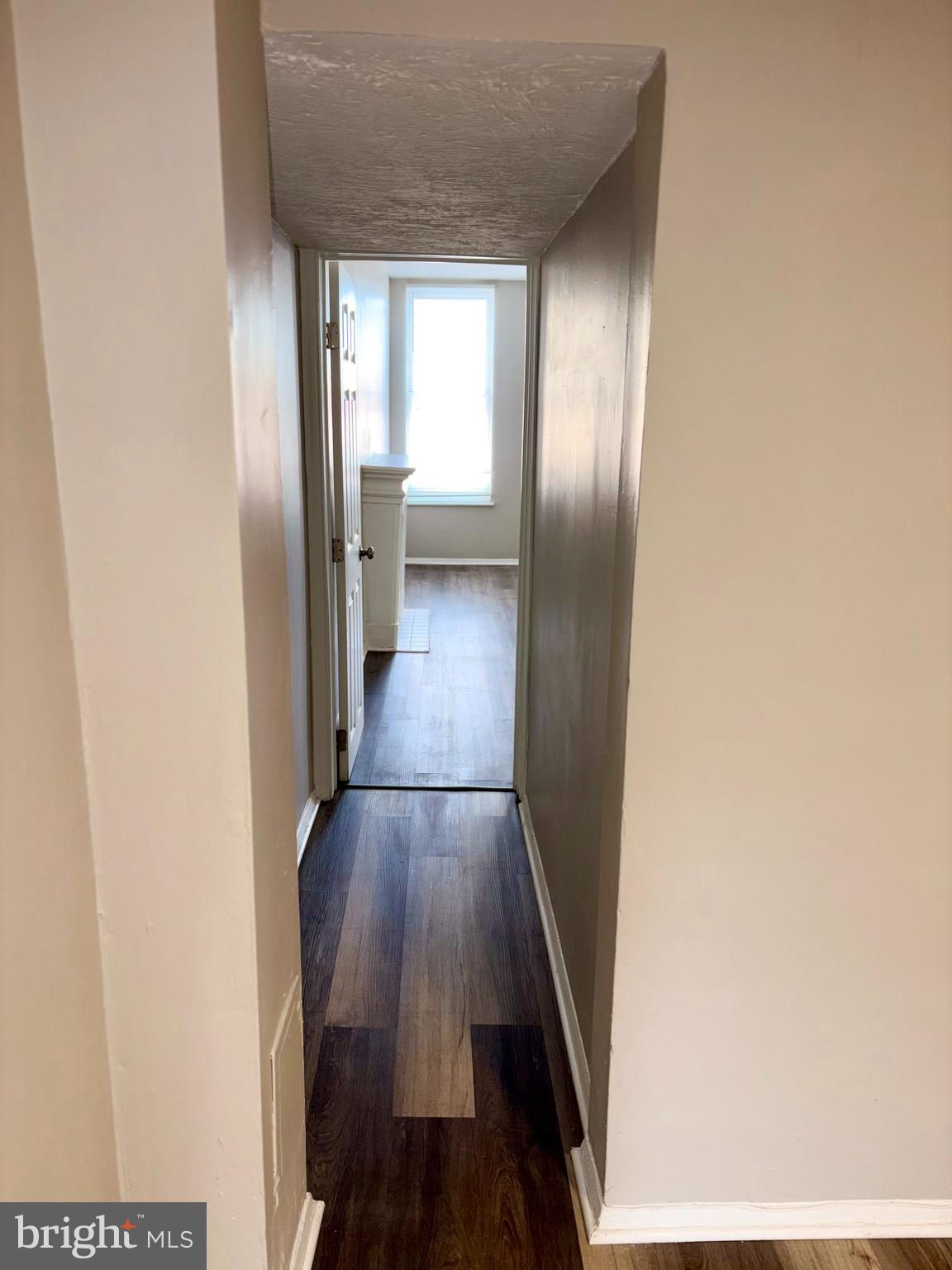 244 North Fulton Avenue, Unit 2 Baltimore, MD 21223 - Photo 5 of 14 Hallway to Primary Bedroom
