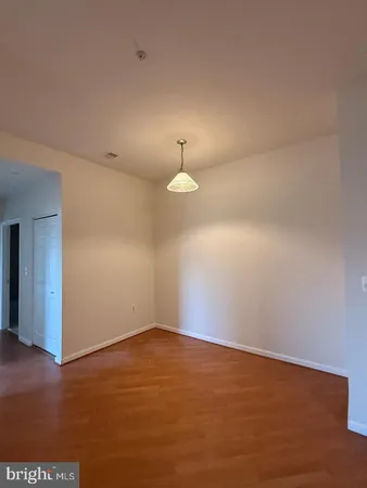 a view of a balcony with wooden floor
