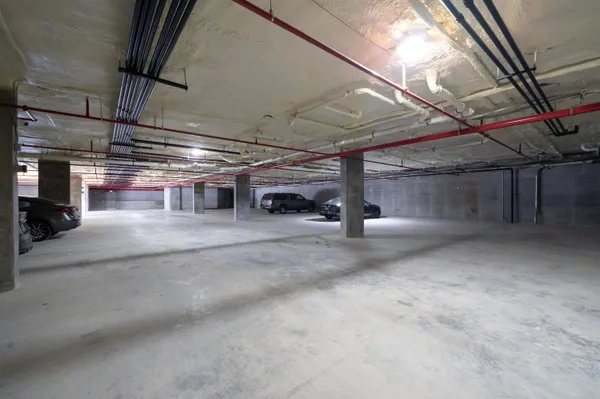 a view of parking garage with windows