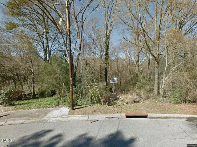 a view of a road with a building