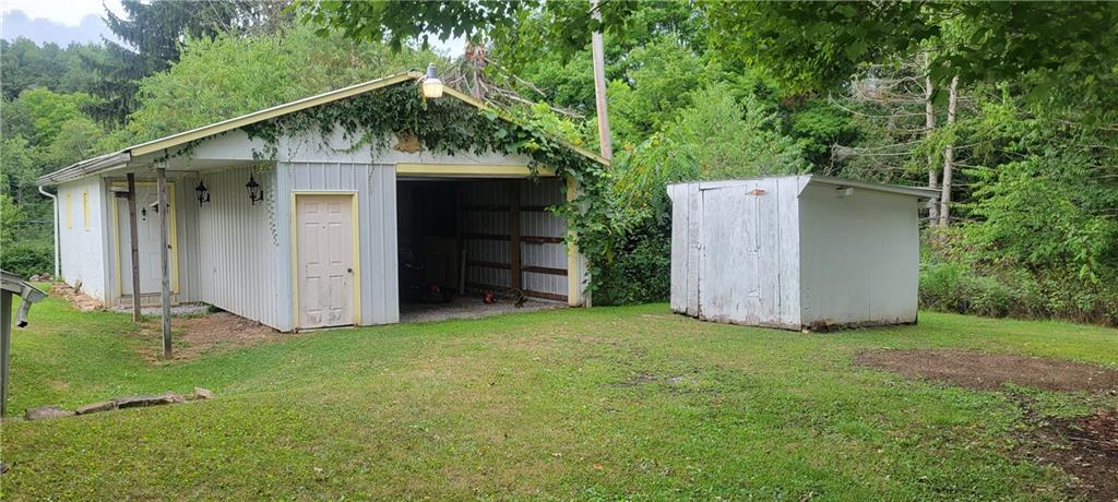 111 Walkchalk Road Kittanning, PA 16201 - Photo 8 of 32 Spacious garage that could fit 2 cars deep