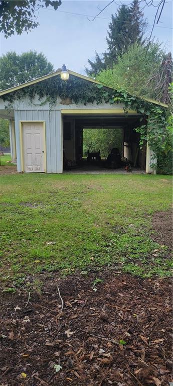 111 Walkchalk Road Kittanning, PA 16201 - Photo 9 of 32 Open up Both garage doors and you could drive right through