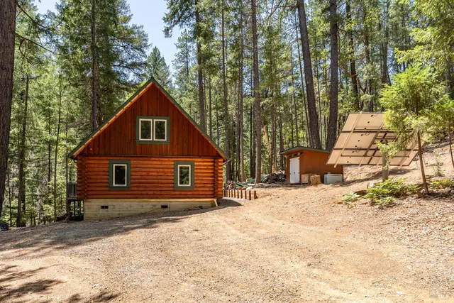 a house with trees in the background