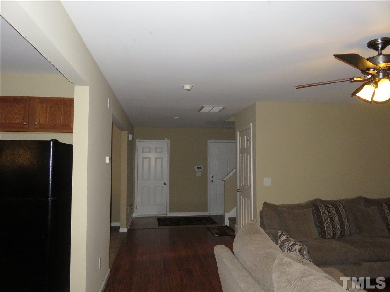 4124 Dalcross Road Raleigh, NC 27610 - Photo 7 of 14 a living room with furniture and a couch