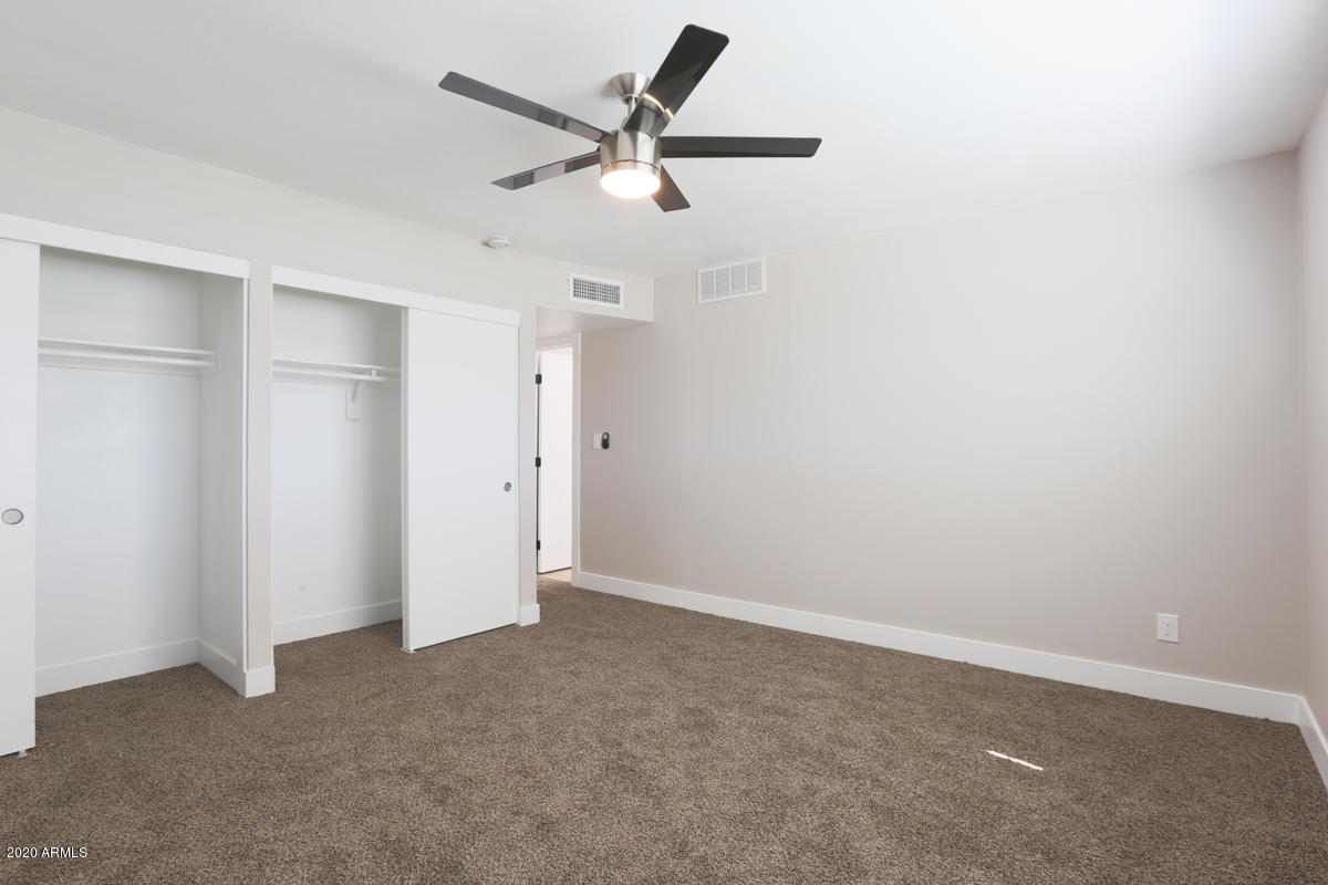 1817 East Alameda Drive Tempe, AZ 85282 - Photo 23 of 31 a view of a big room with a ceiling fan