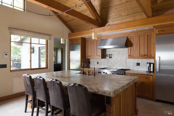 a kitchen with granite countertop lots of counter top space
