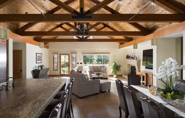 a view of a dining room with furniture window and outside view