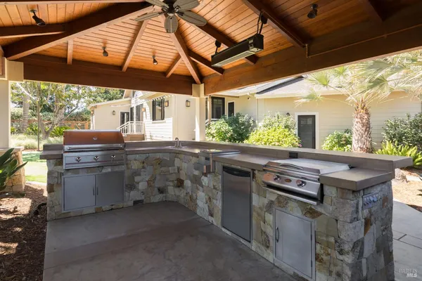 a kitchen with a stove and a microwave
