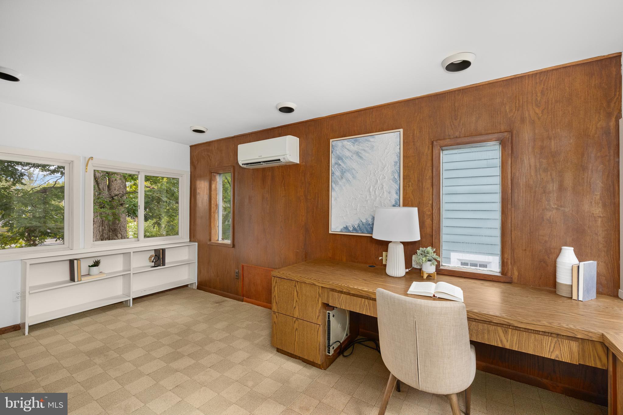 5410 39th Street Northwest Washington, DC 20015 - Photo 17 of 28 a living room with furniture and a window