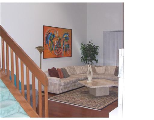 7727 La Mirada Drive, Unit 118 Boca Raton, FL 33433 - Photo 2 of 16 a living room with furniture and a potted plant