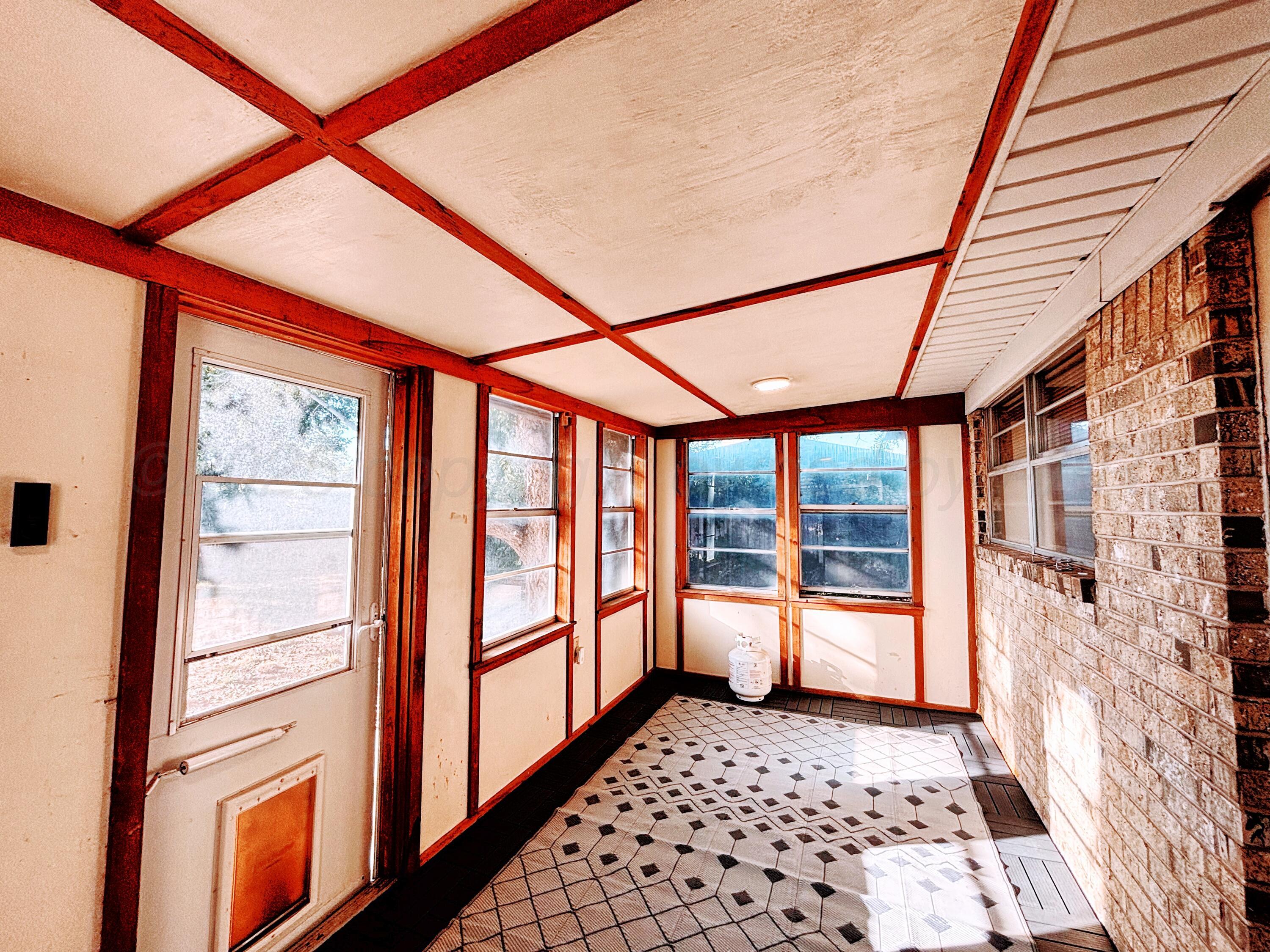 3210 South Ash Street Perryton, TX 79070 - Photo 21 of 28 a room with a large window